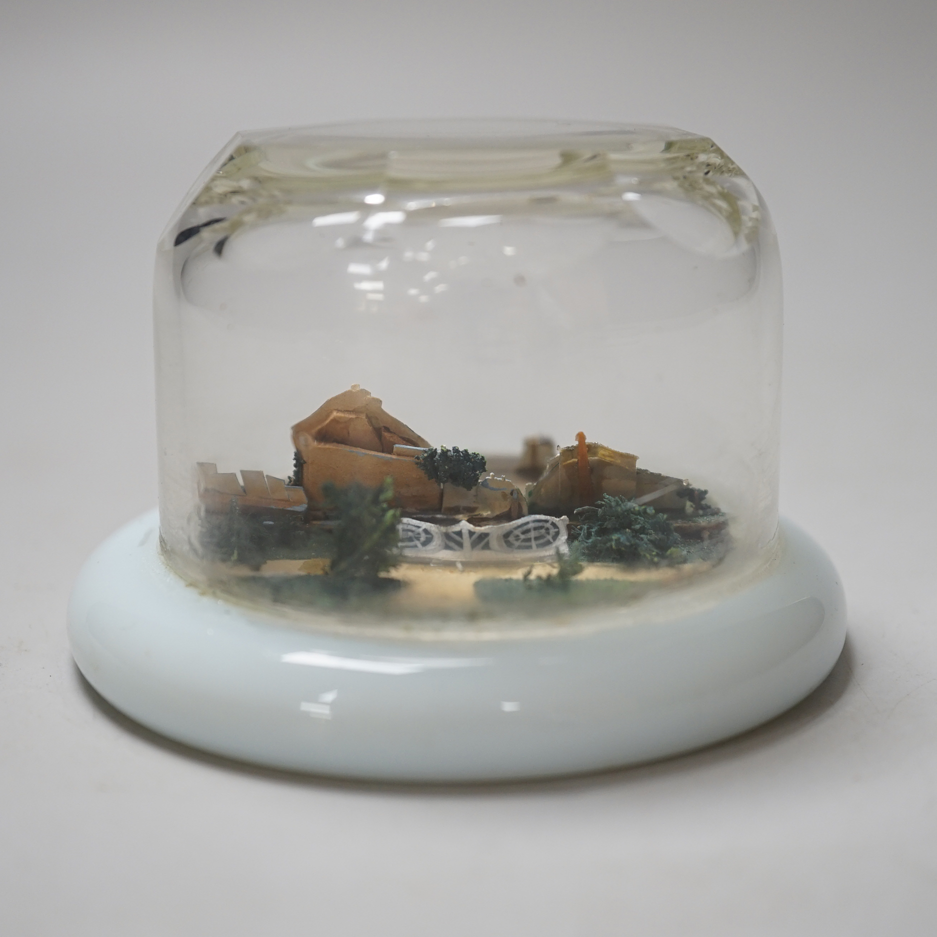 An unusual 19th century Continental diorama cut card glass cased paperweight, 6cm high